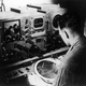 15th August 1945: A member of the navy runs a check on some experimental new military radar equipment at the naval air station in Anacostia, District of Columbia.